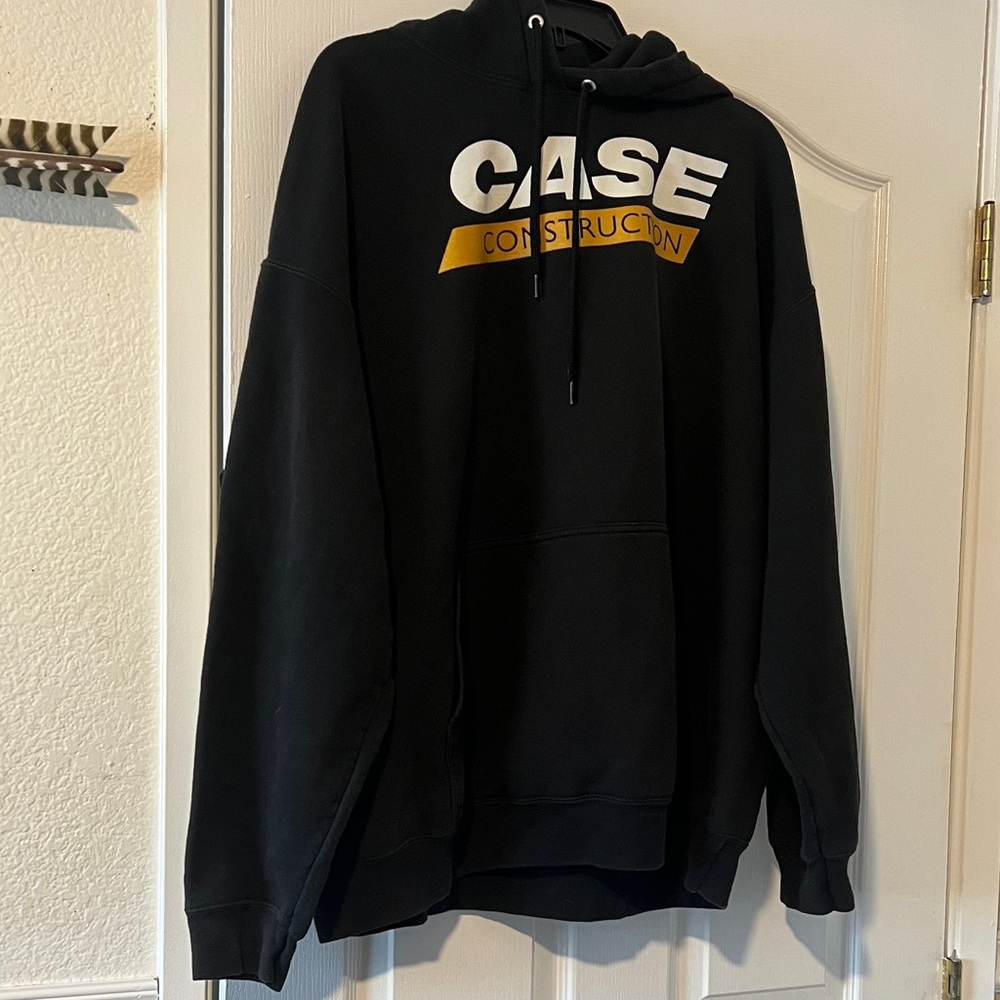 Port and Company Black Hoodie with White and Gold CASE Construction Logo